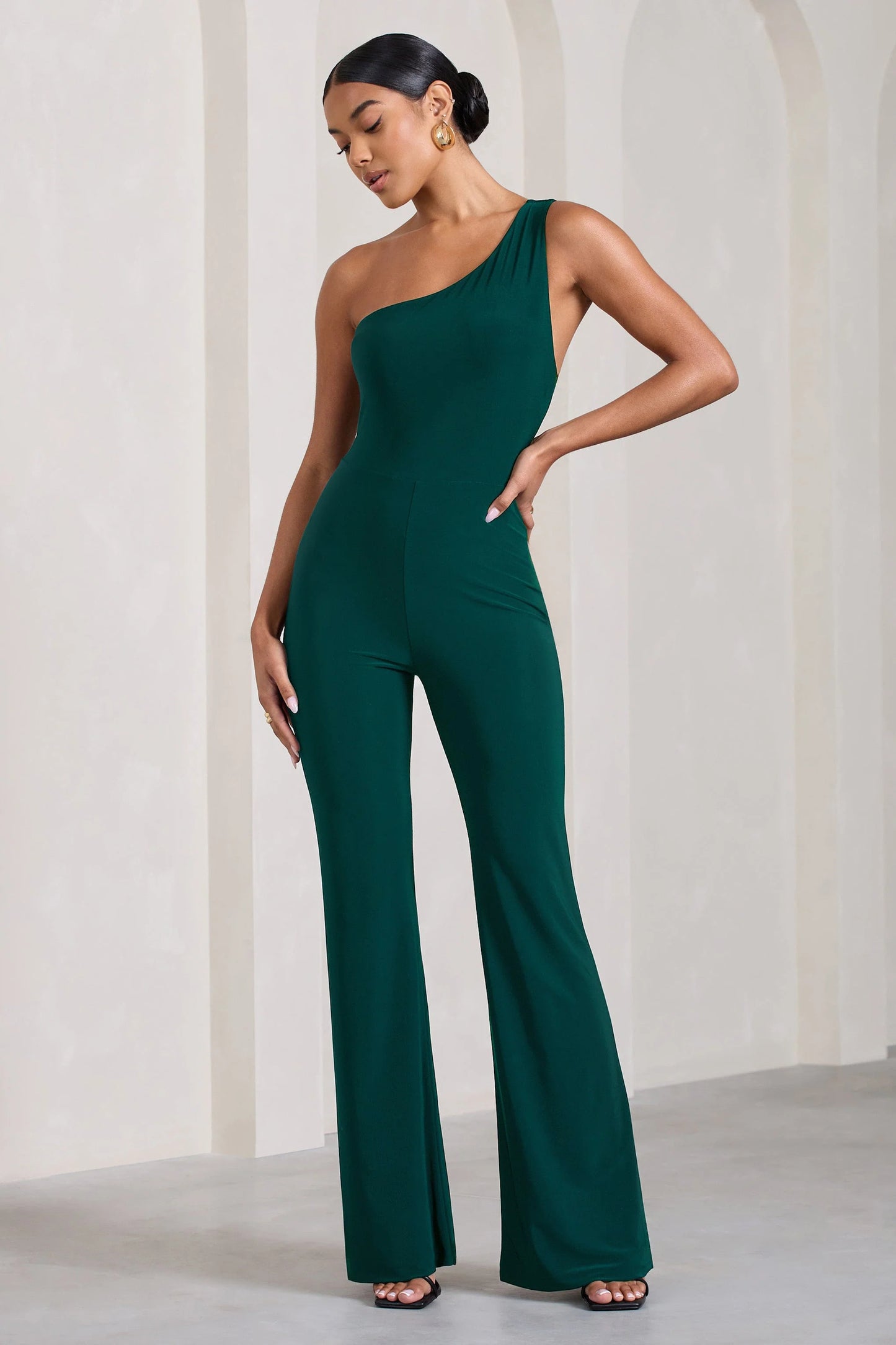 In The Dark | Bottle Green Sleeveless Asymmetric Flared-Leg Jumpsuit